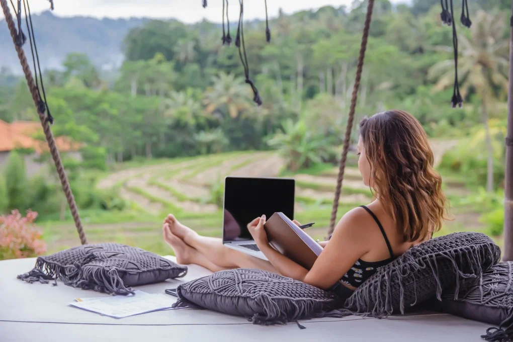 Professional Digital Nomad working in a Bali bamboo office with Starlink setup